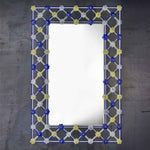 Load image into Gallery viewer, specchio veneziano rettangolare con cornice composta da canne in vetro di murano di colore blu/cristallo e fiori di colore oro/blu/cristallo su fondo argento
